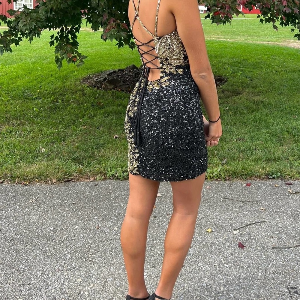 Elegant Black and Gold Sequin Dress